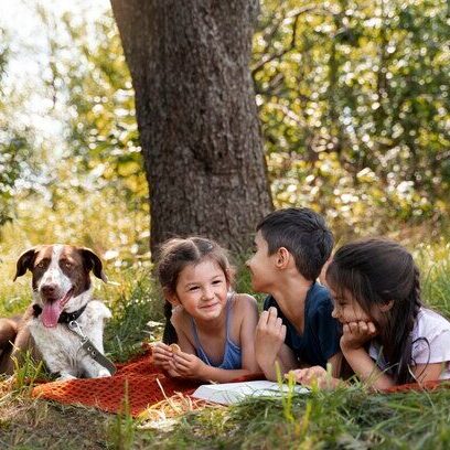 Children and Dog in Field